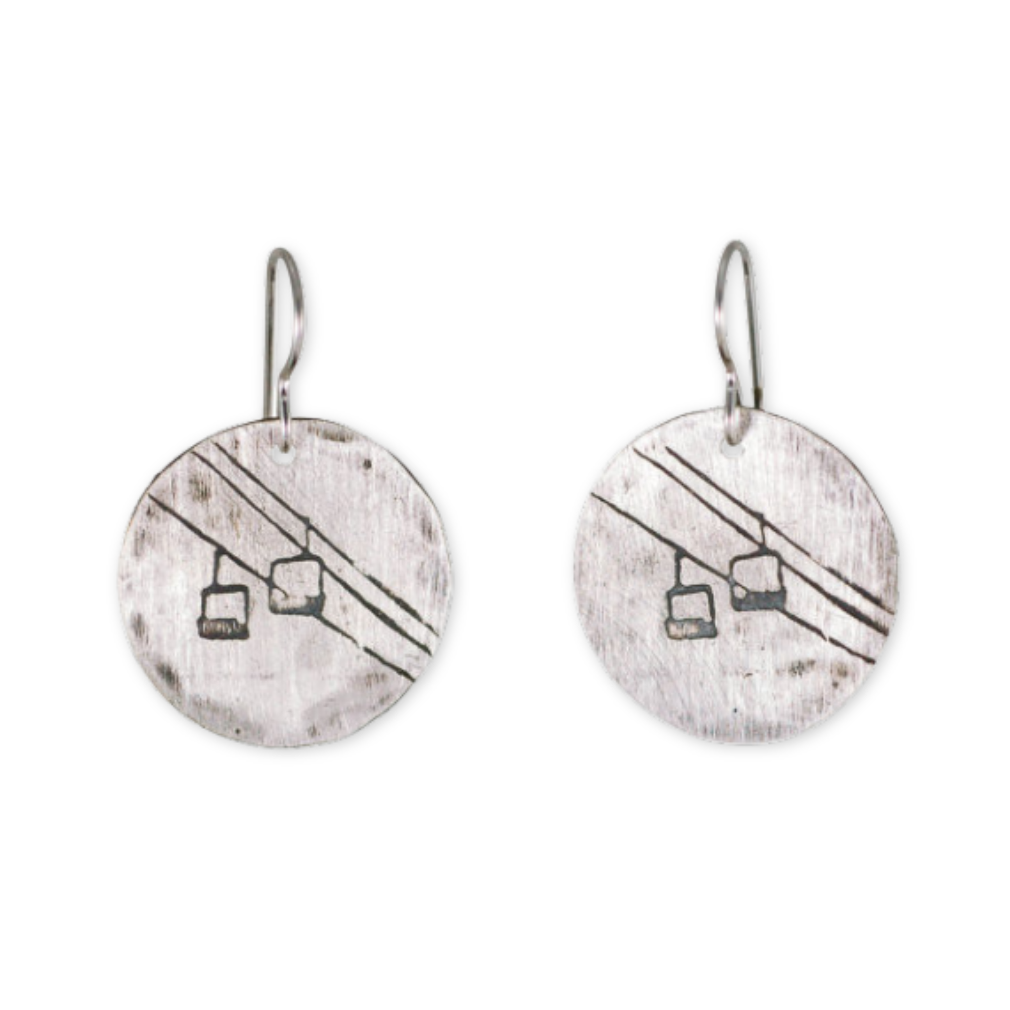 silver earrings with a chairlift design