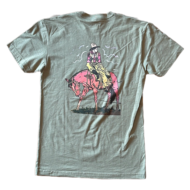 back of painted cowboy shirt on green