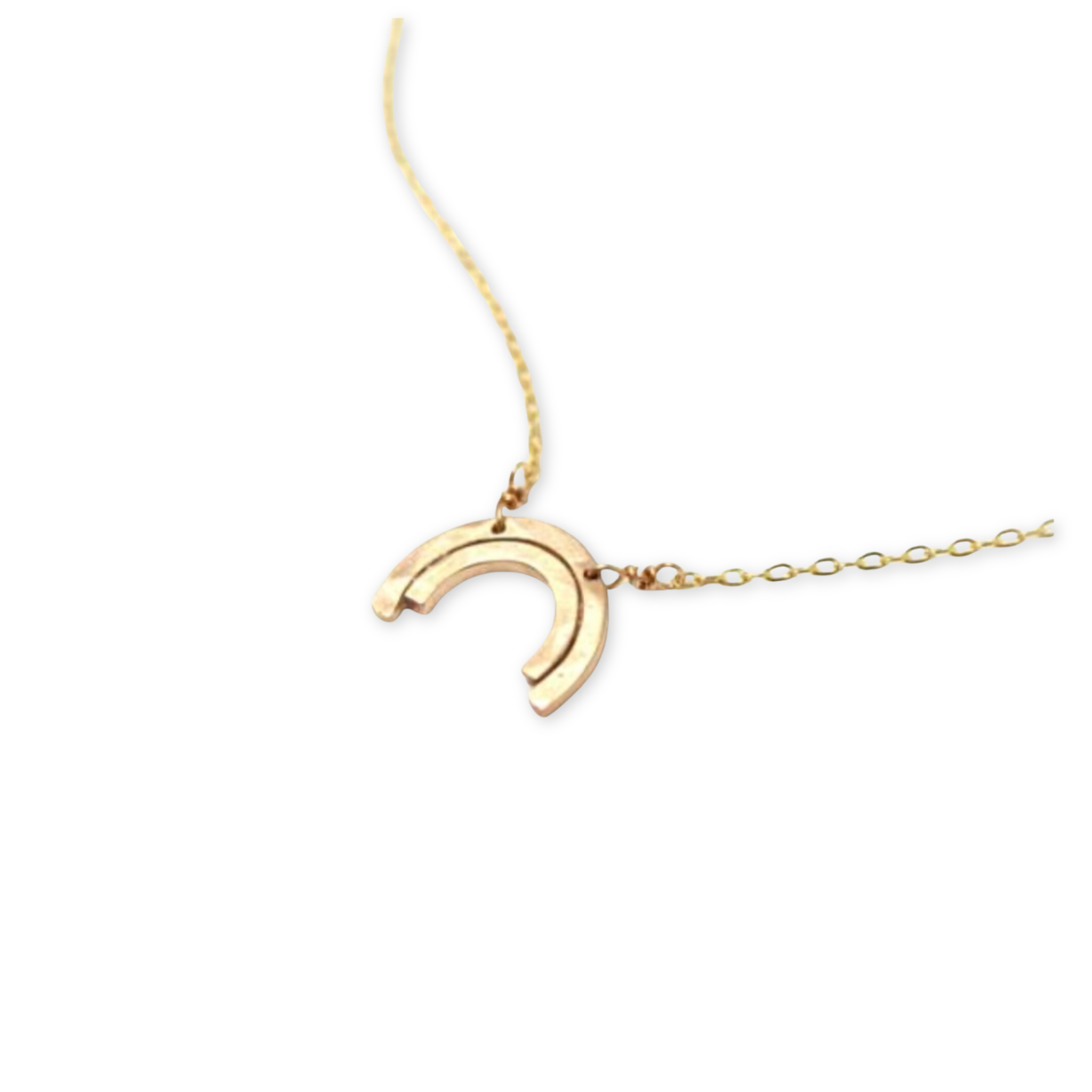 gold necklace with two rainbows