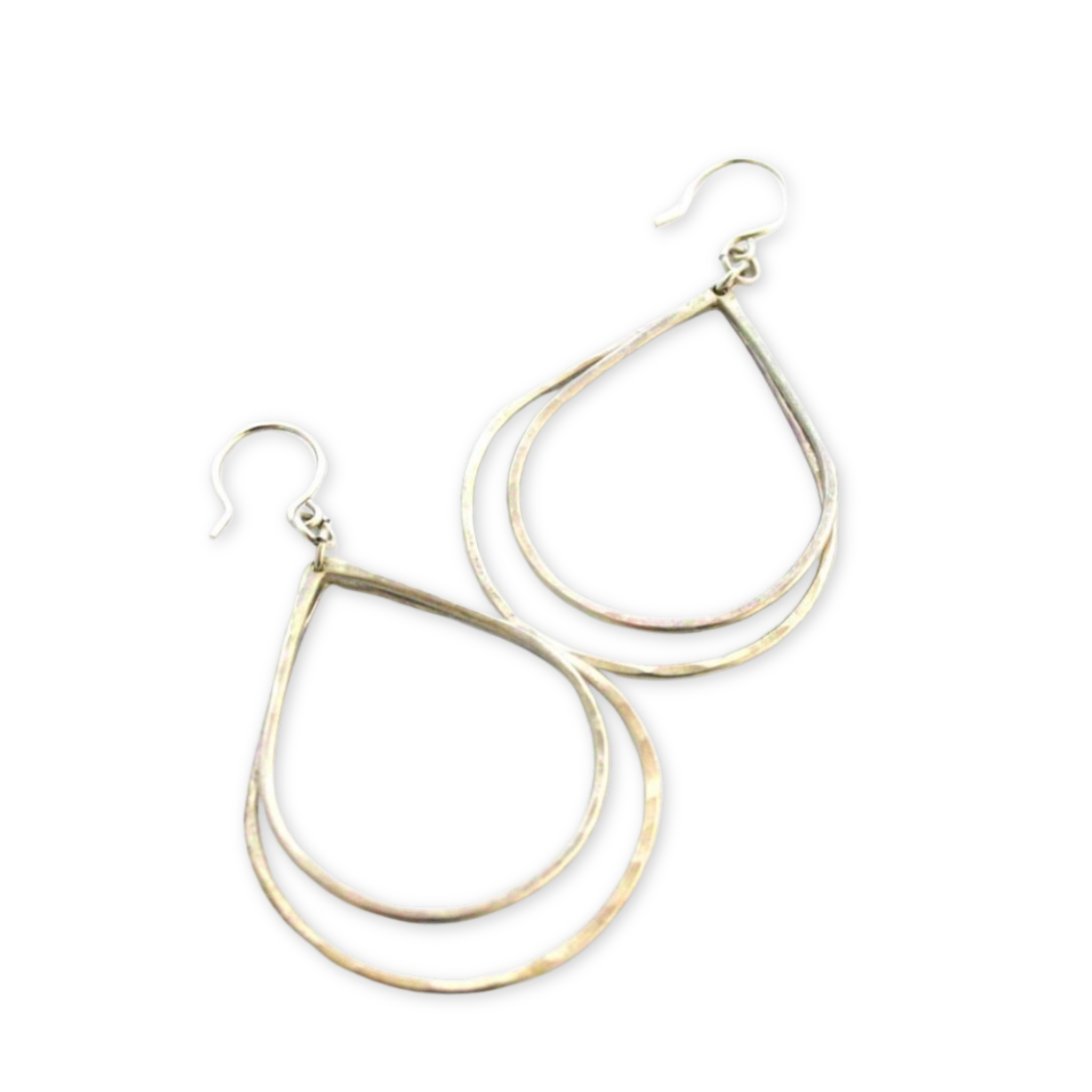 two nested open hammered tear drop pendants hanging on an ear wire