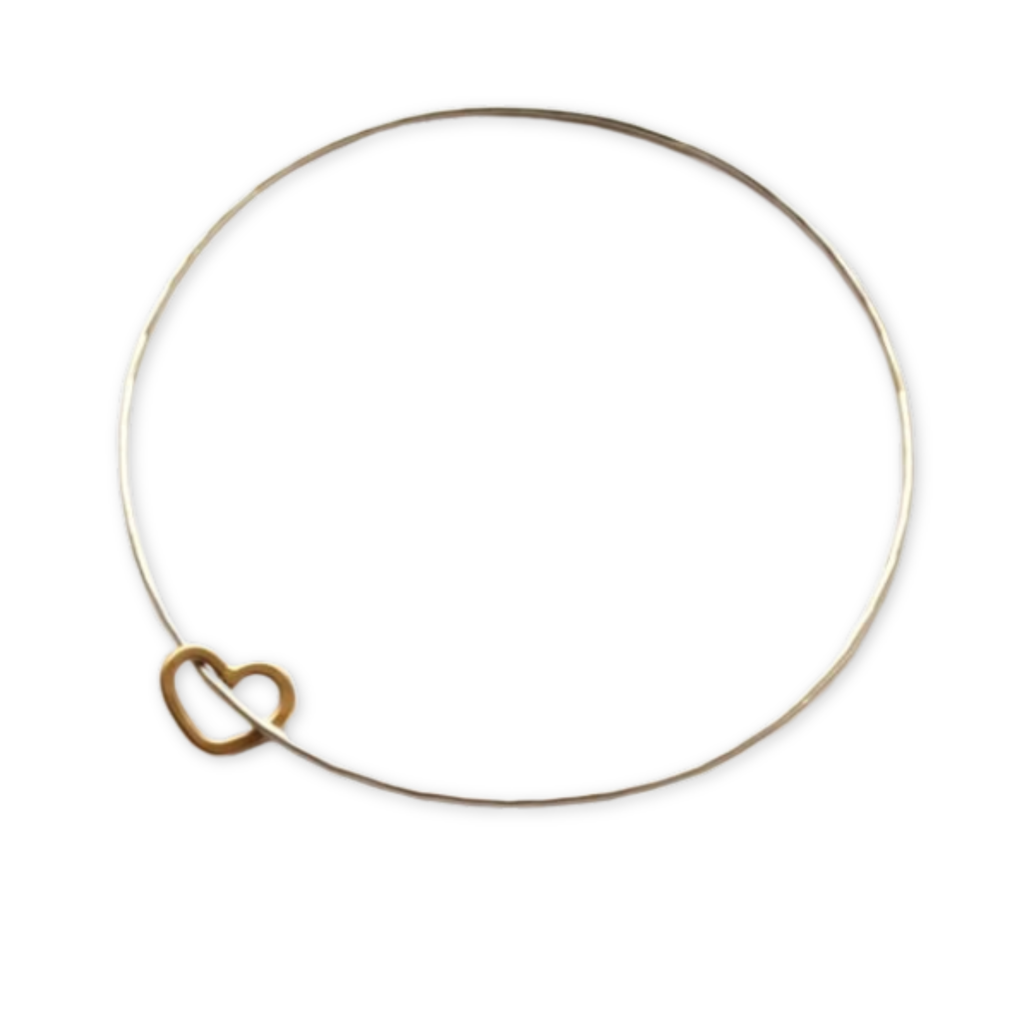 a bangle with a heart charm on it