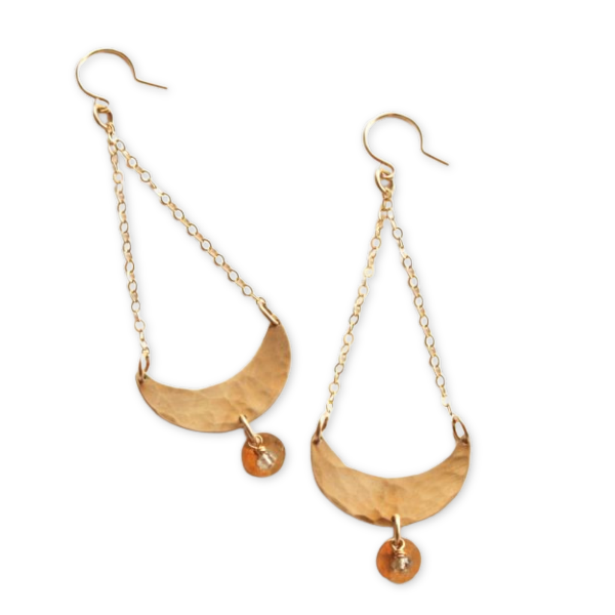 a pair of earrings with a crescent hanging from two chains and a round disk and a bead
