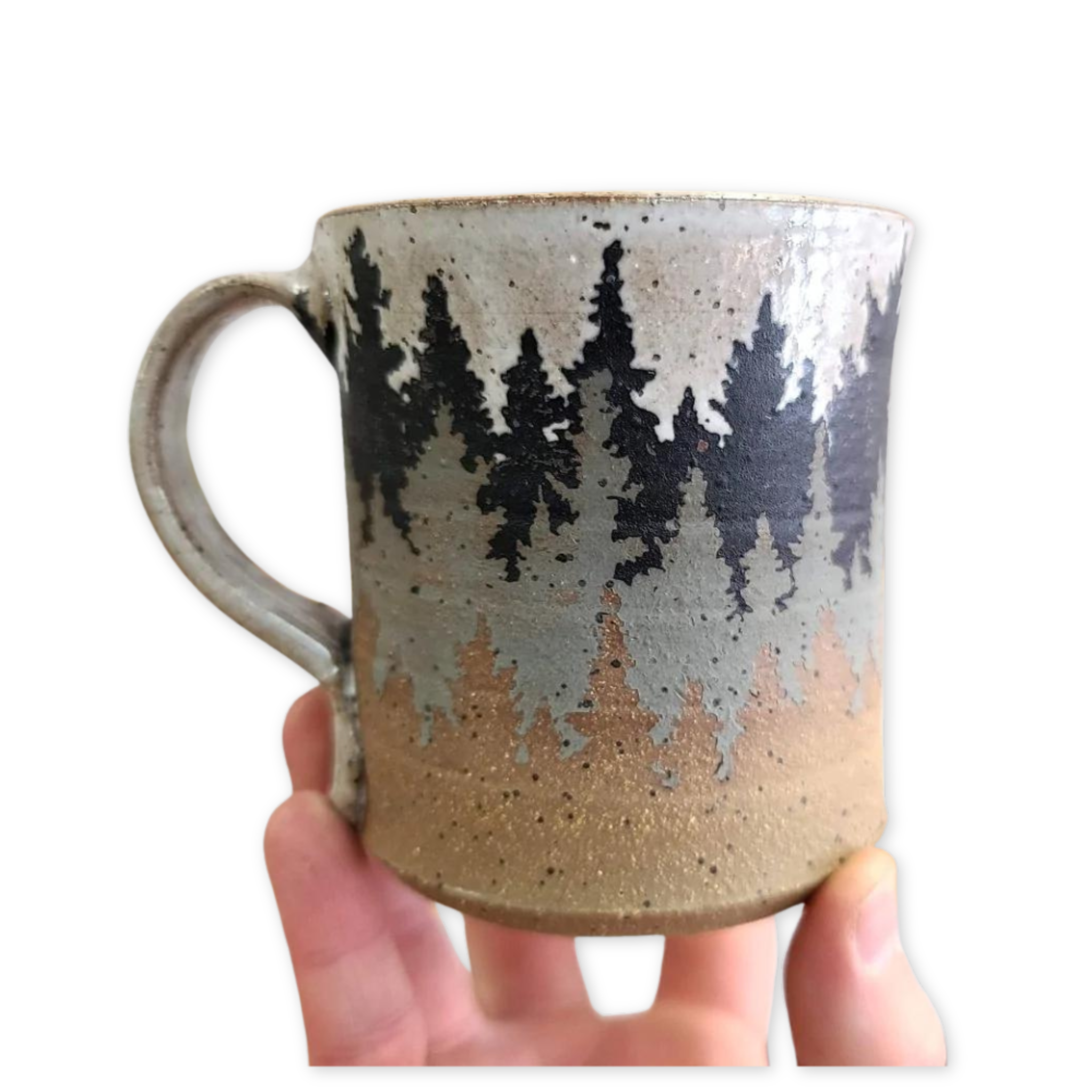 speckled ceramic mug with layered pine tree design