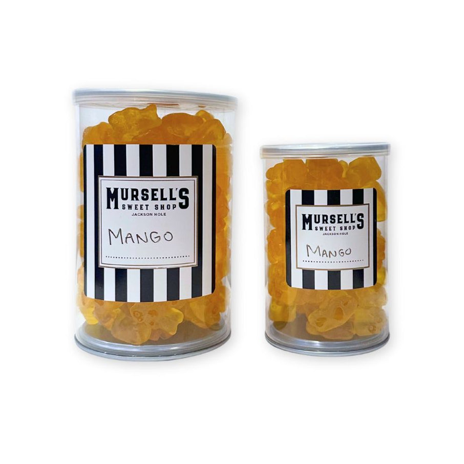 Small and large jars of mango flavored gummi bears from Mursell's Sweet Shop.