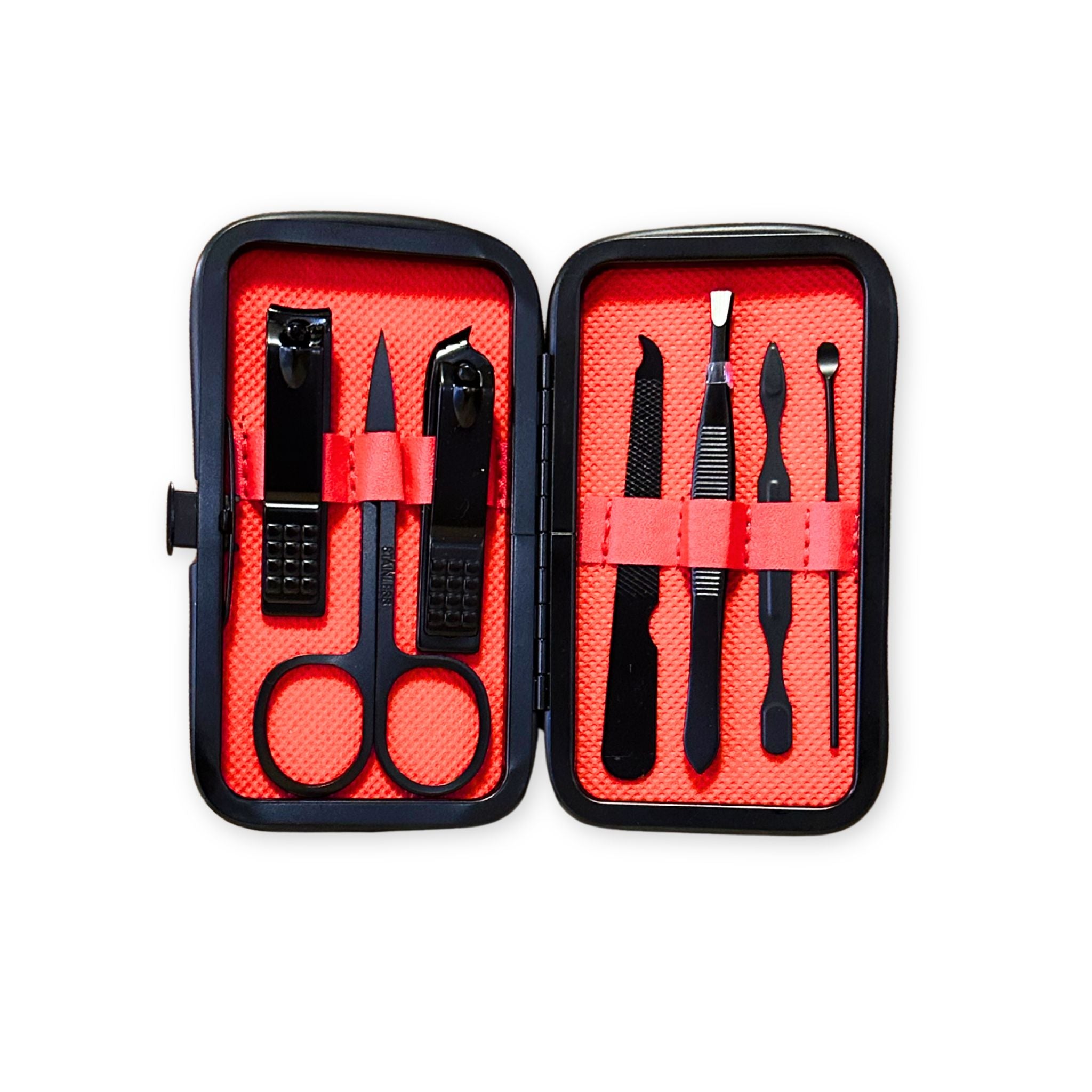 Manicure set with black tools in a red case on a white background