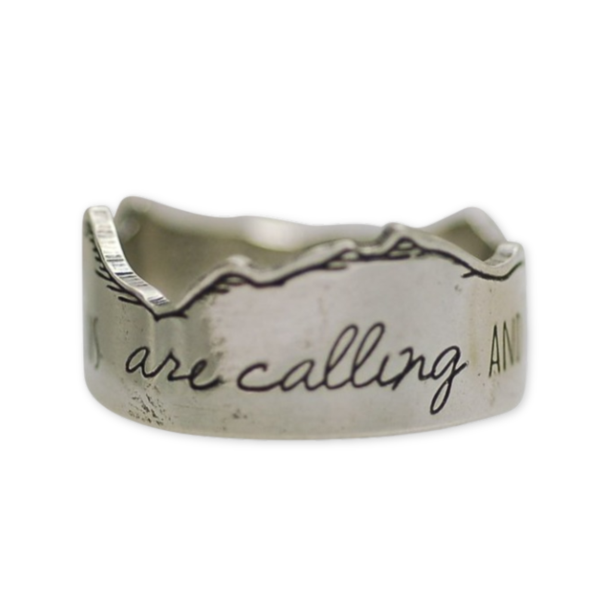 ring with mountain line roller and the words the mountains are calling