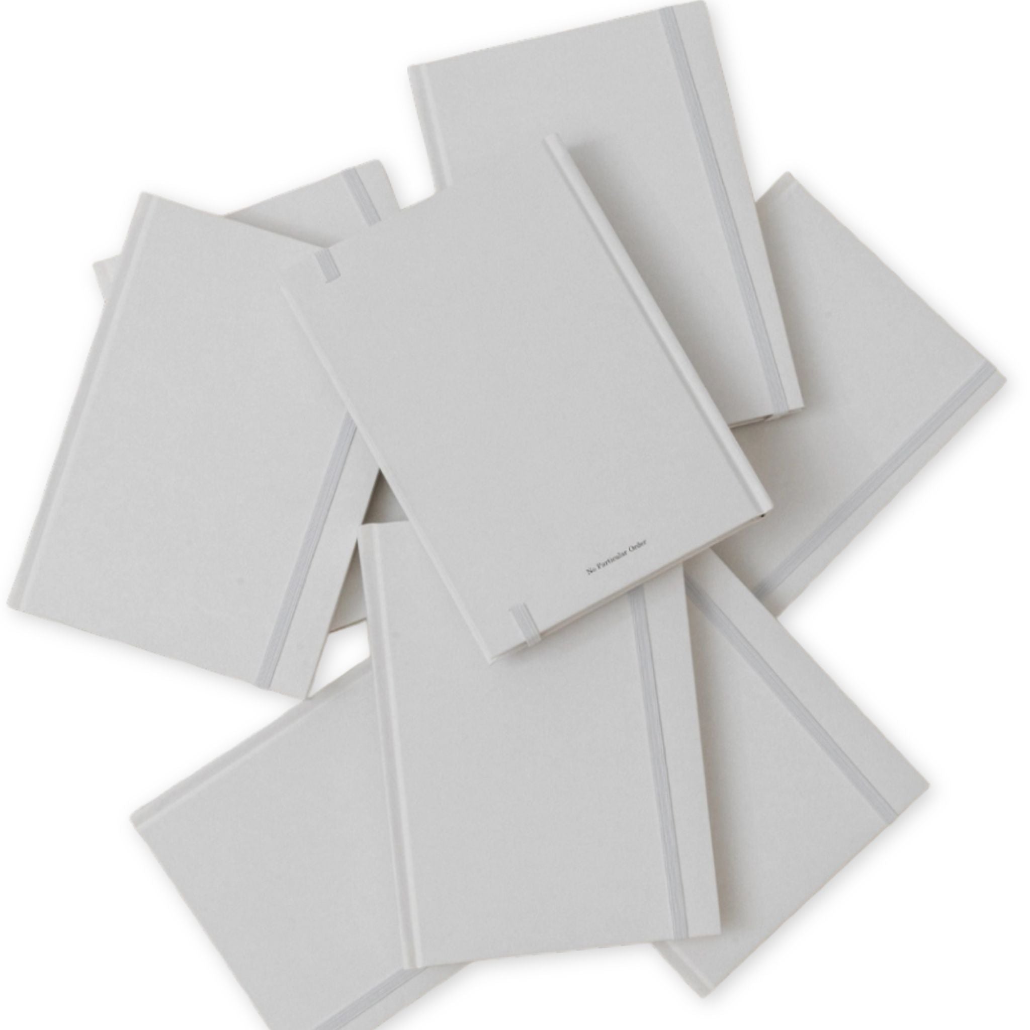 Stack of white notebooks on a white background