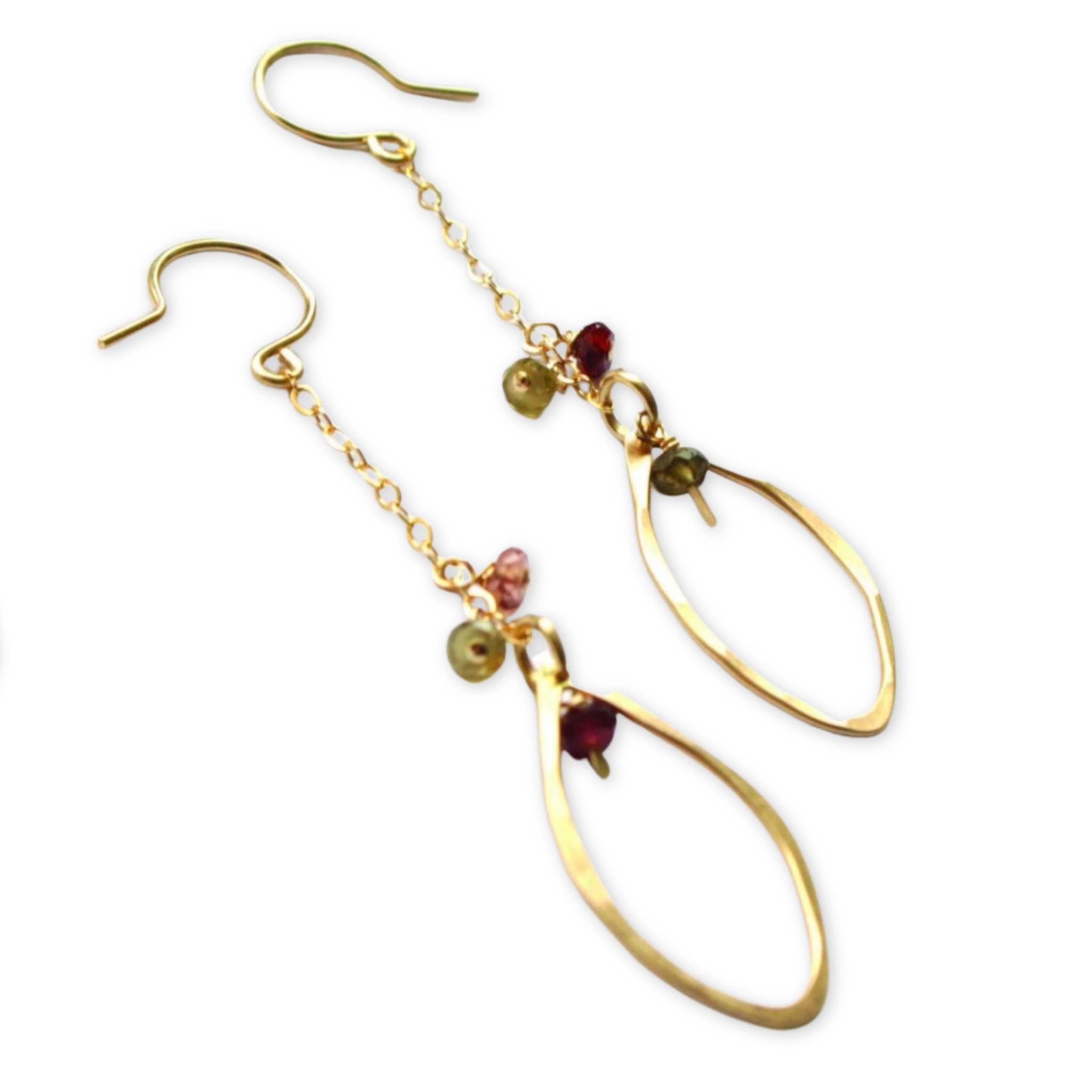 open hammered leaf inspired pendants hanging from a delicate earring chain and adorned with three small faceted stones