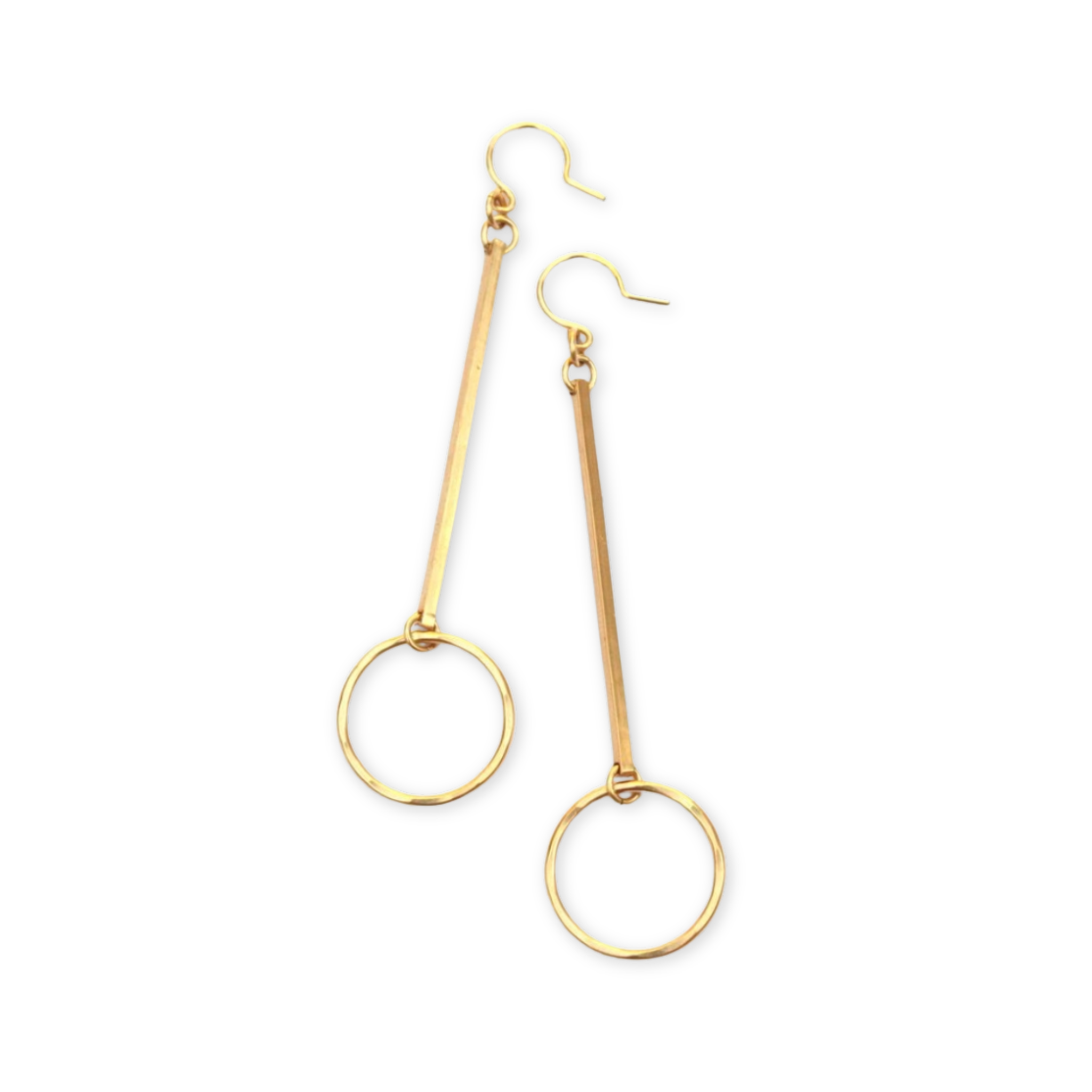 dangling earrings with a long thing stick of metal and a hanging open circle