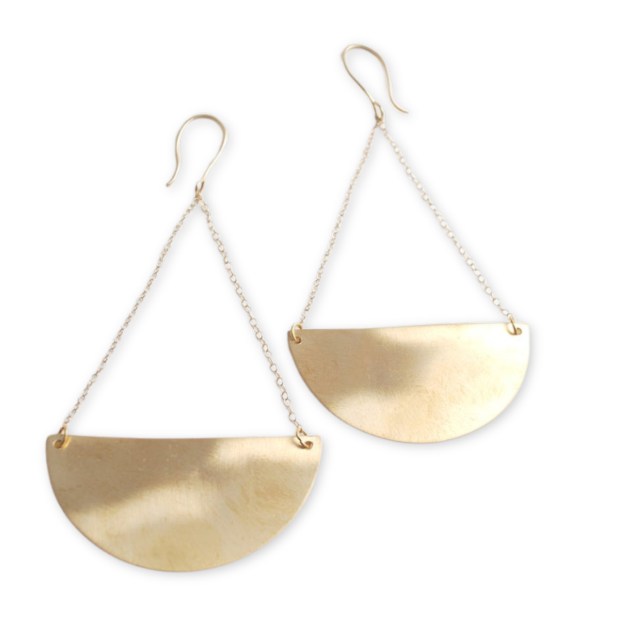 earrings featuring scalloped shaped pendants hang on thin chains