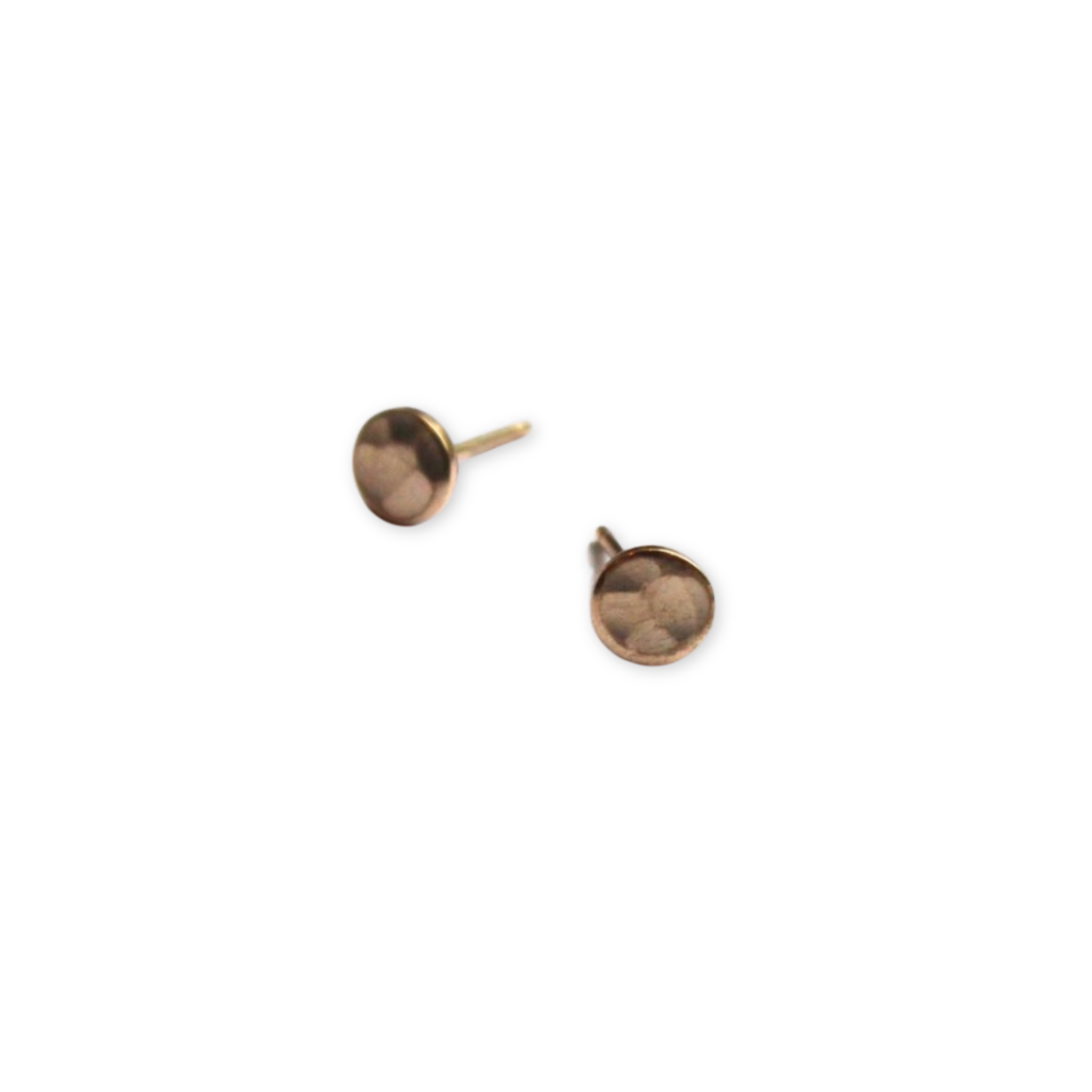 tiny stud earrings with small textured round discs