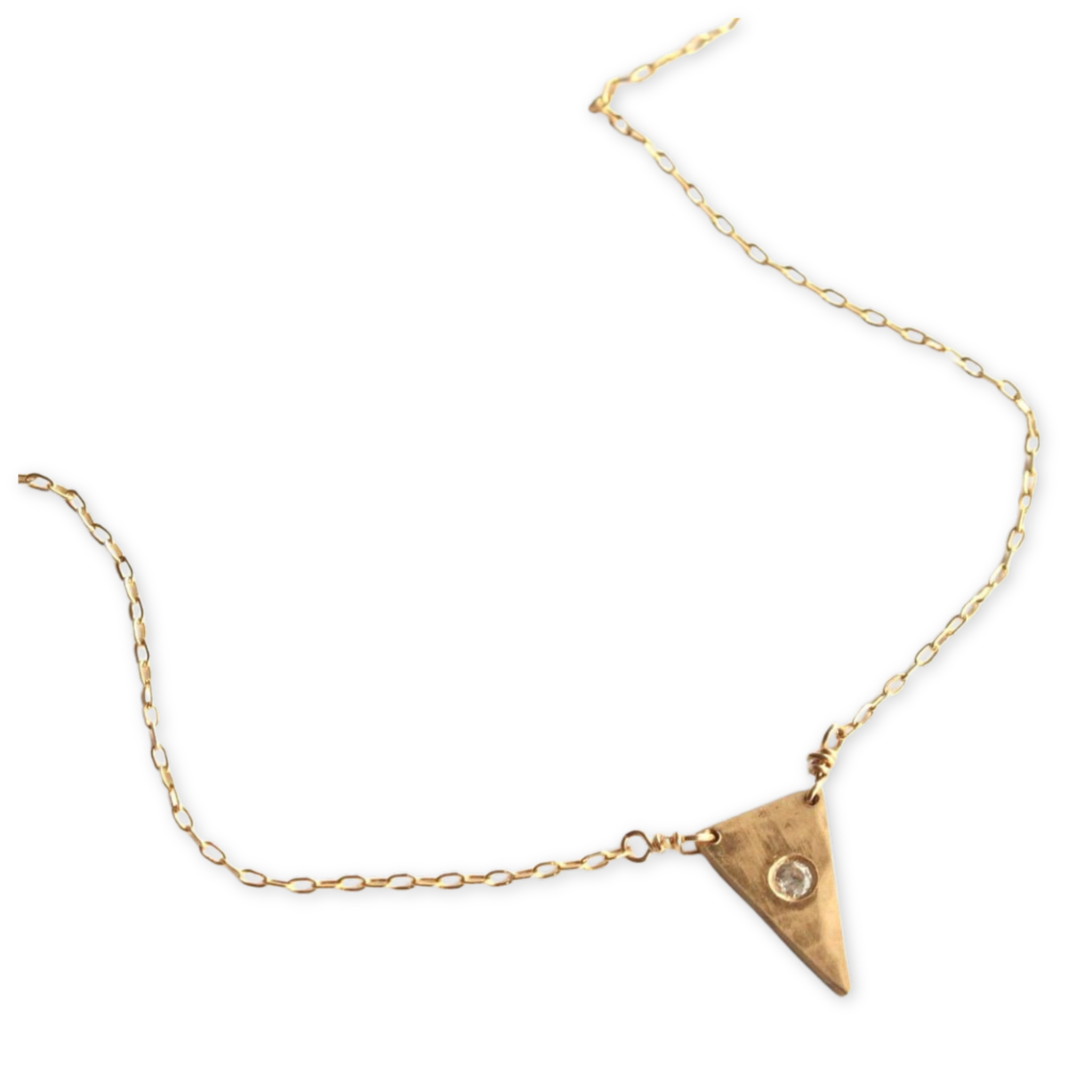 textured triangle pendant set with swavorski cubic zirconia hanging from a thin chain necklace