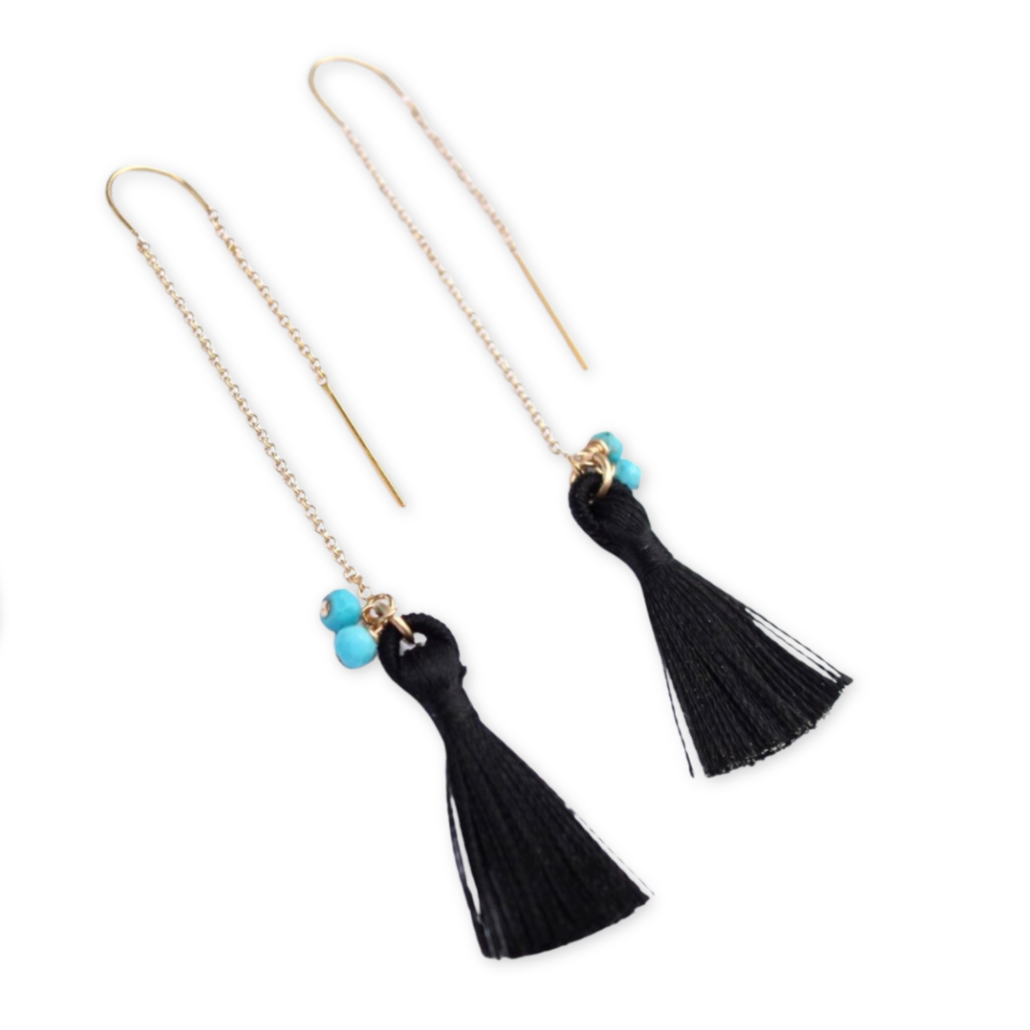 ear threaders with black tassels and turquoise beads hanging on delicate chains