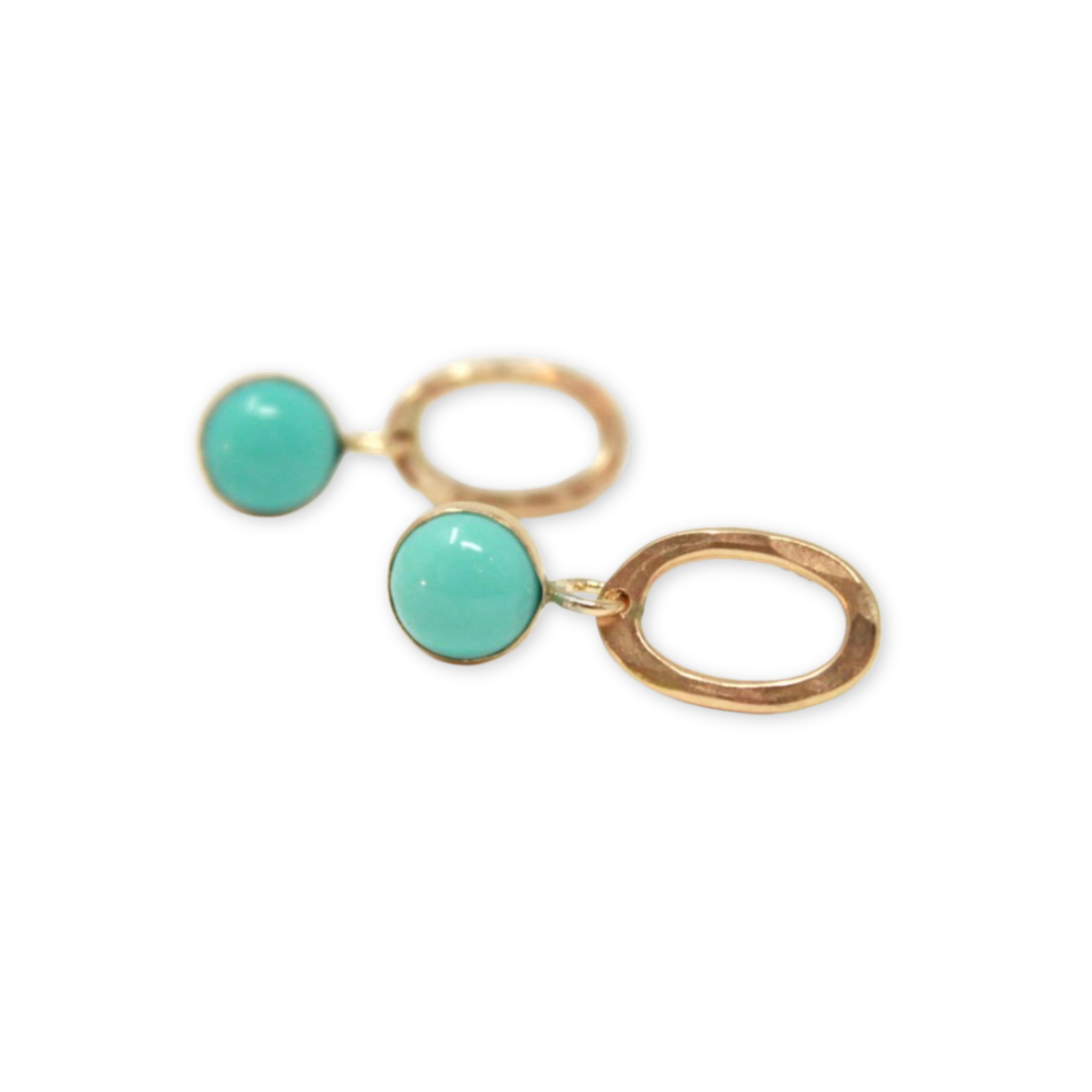 small oval hoops hanging from a mexican turquoise stone