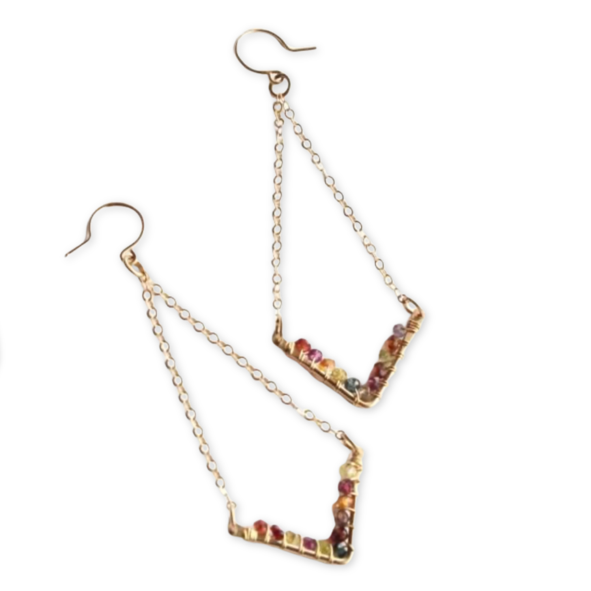 chevron shaped pendants wrapped in tiny faceted stones and hanging from thin chains and ear wire