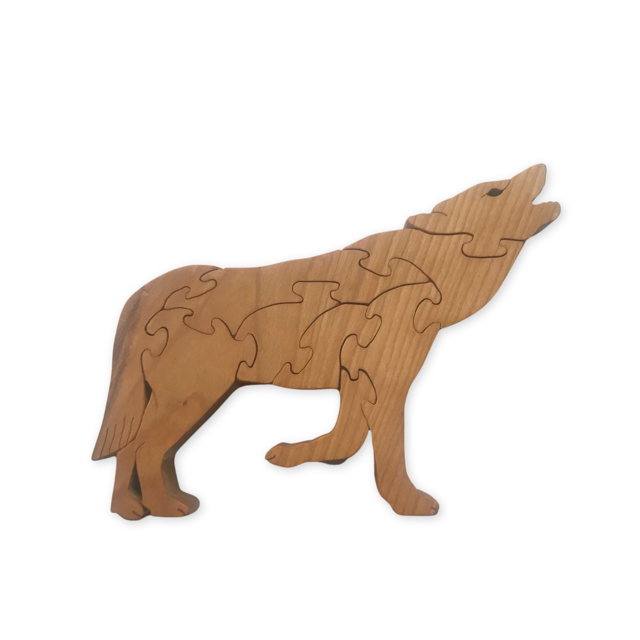 handcrafted wooden puzzle in the shape of a howling wolf