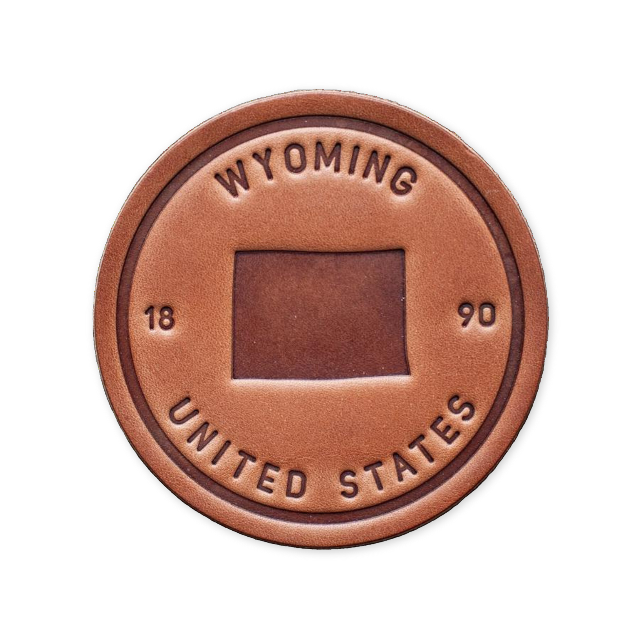 hand cut leather coaster with an image of the state of wyoming