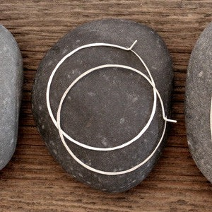 Handmade sterling silver earrings crafted in Wyoming.  Each pair is hand hammered.