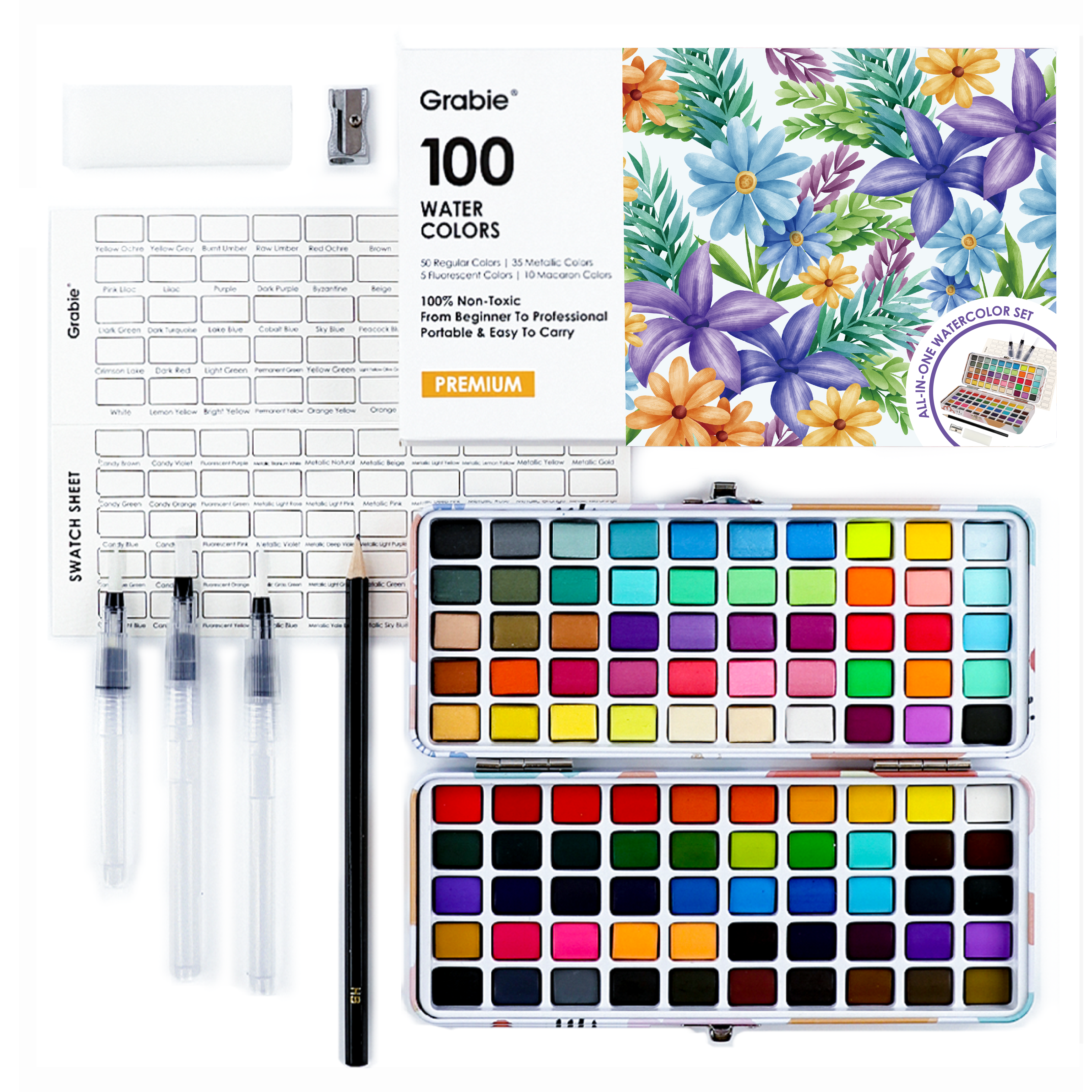 Grabie watercolor set with watercolors, brushes, and a color chart on a white background.