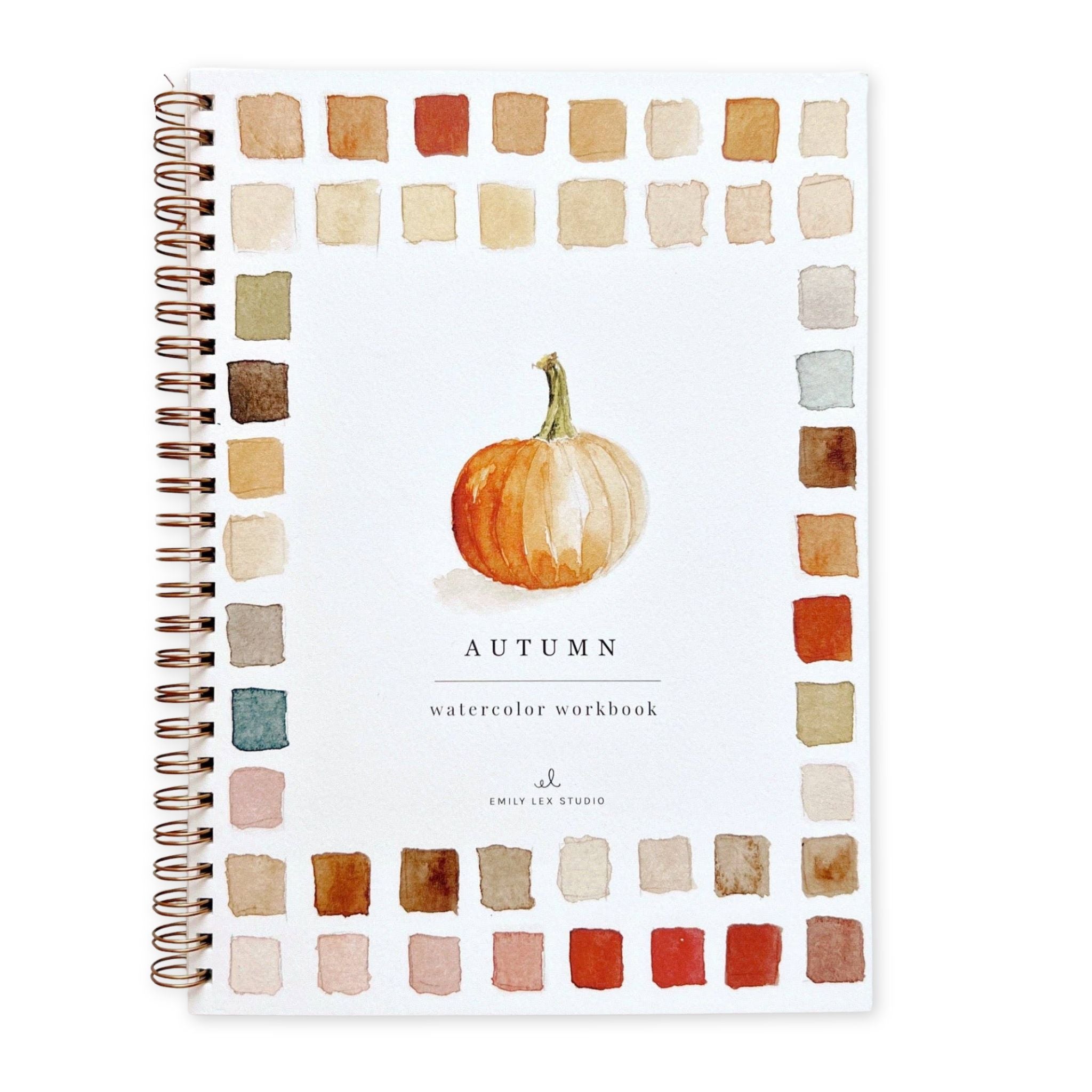 Autumn-themed watercolor workbook with a pumpkin illustration on a white background