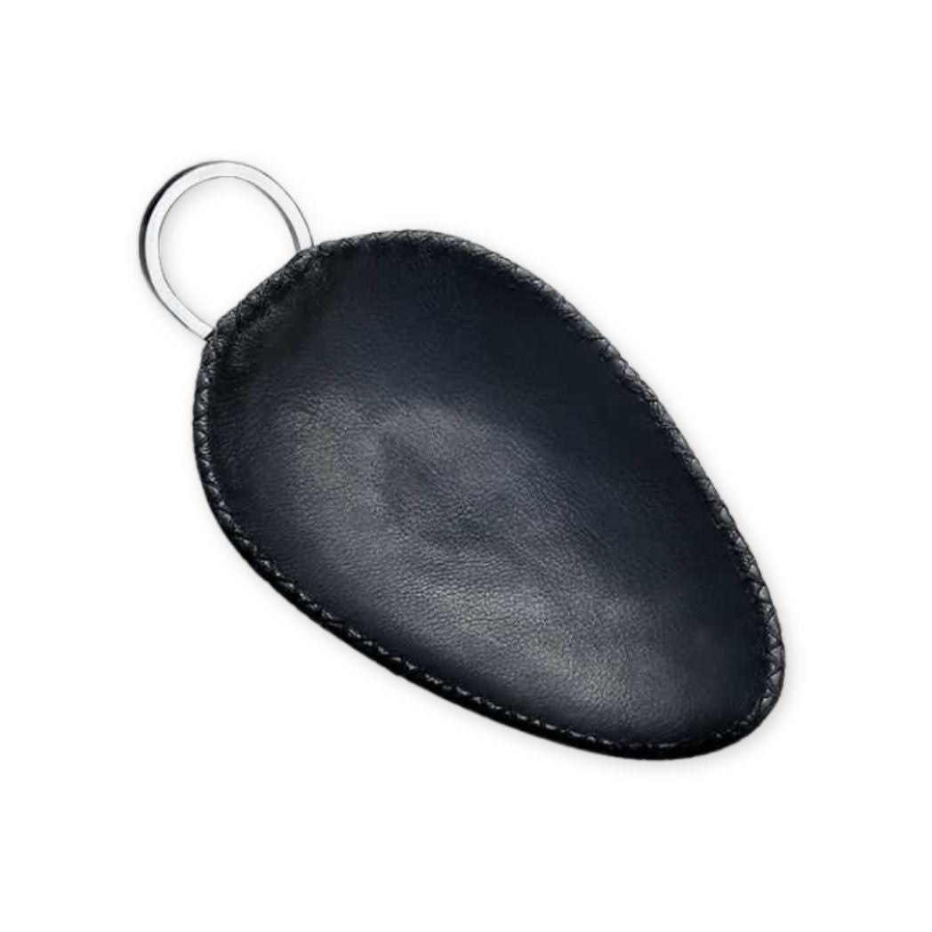 Black leather keychain on a white background