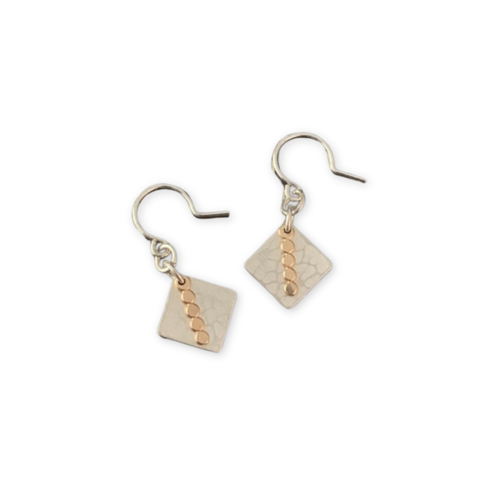 earrings featuring hand cut and hammered diamond shaped pendants topped with a row of dots