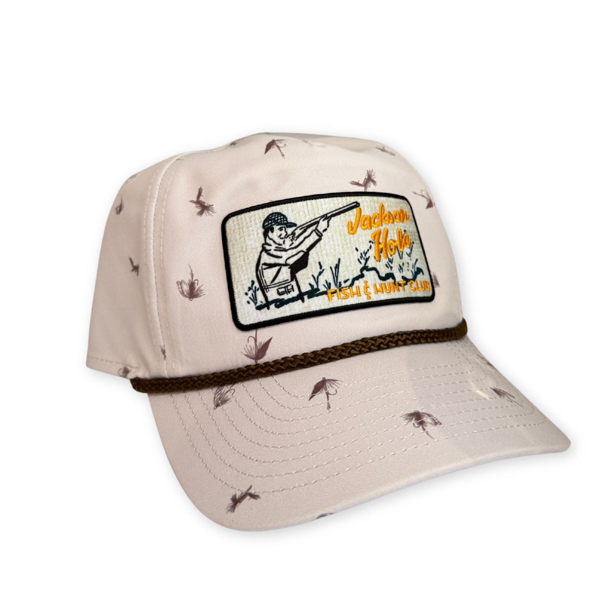 Light khaki cap with fishing-themed design and logo on a white background