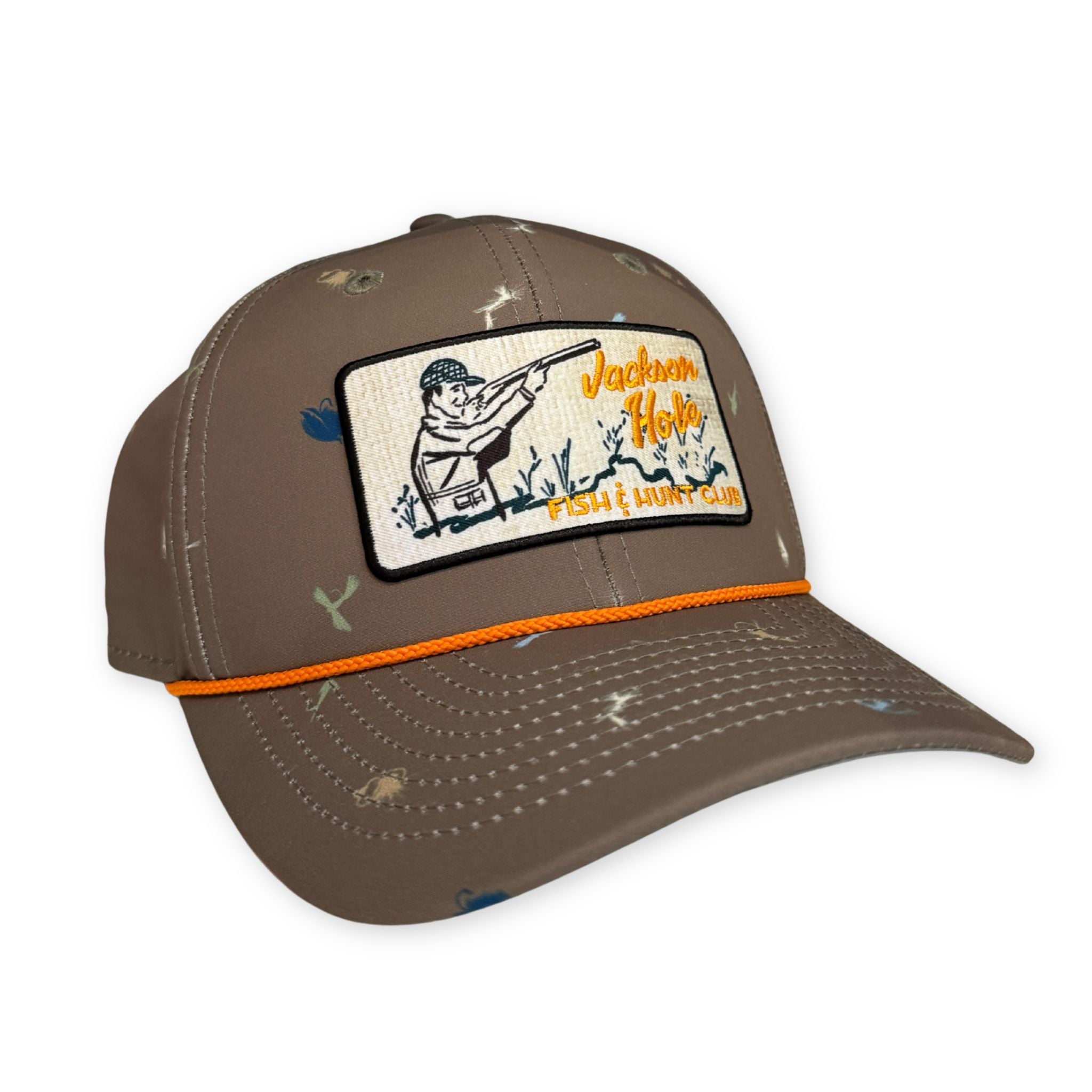Green cap with a logo patch on a white background