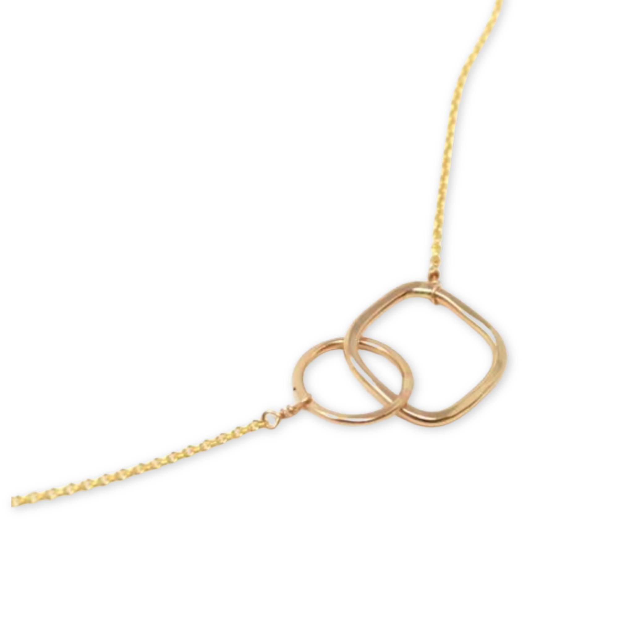 necklace with interlocking hammered circle and square on a thin chain