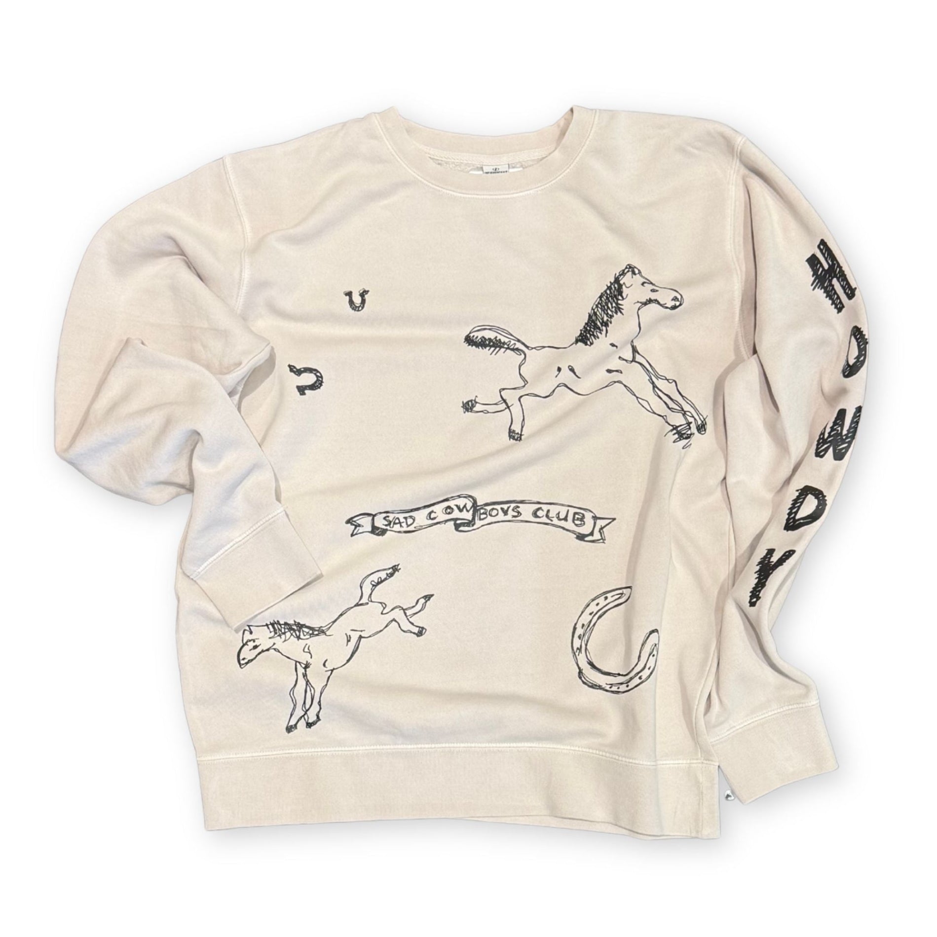 Beige sweatshirt with horse and cowboy club graphics on a white background