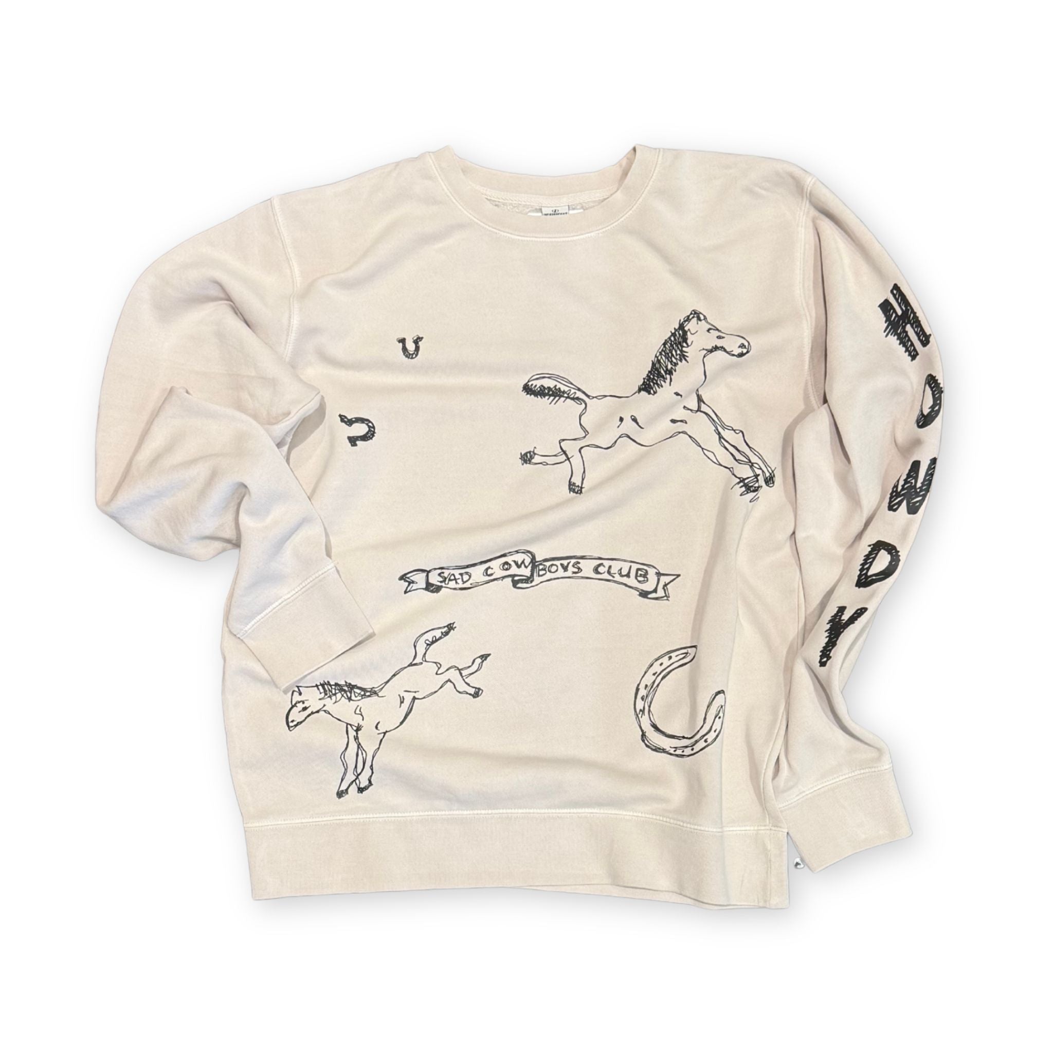 Beige sweatshirt with horse and cowboy club graphics on a white background