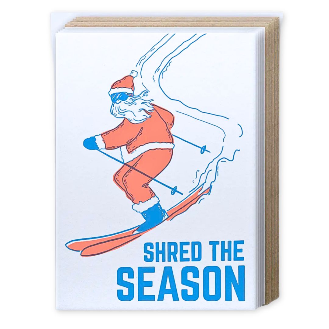 Shred the Season card set depicting Santa skiing