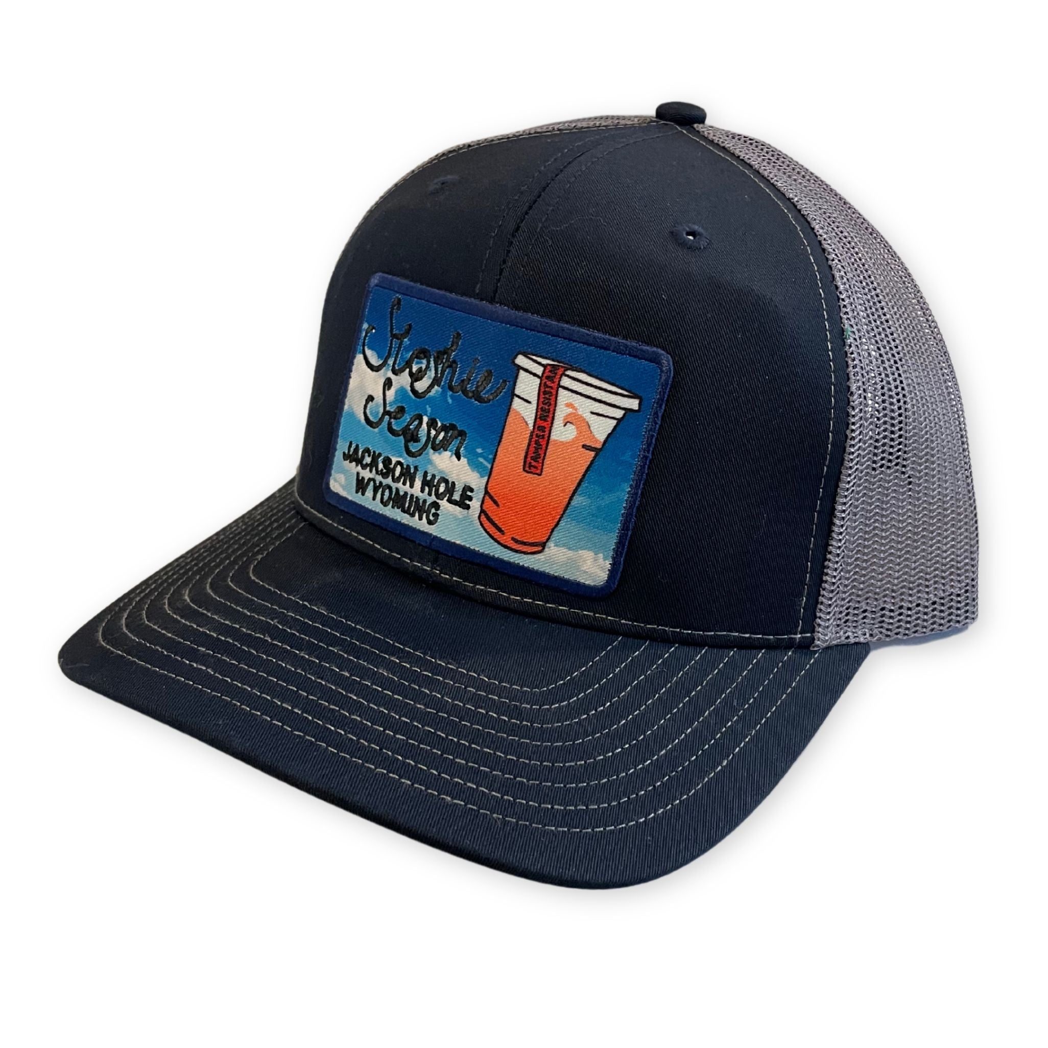 Navy Trucker Hat with Grey Mesh back and a Sloshie Season Patch 