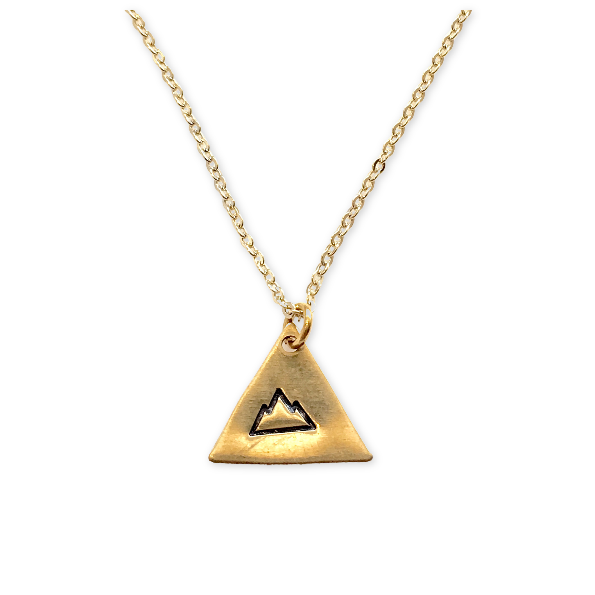gold necklace with triangle pendant and a stamped mountain design