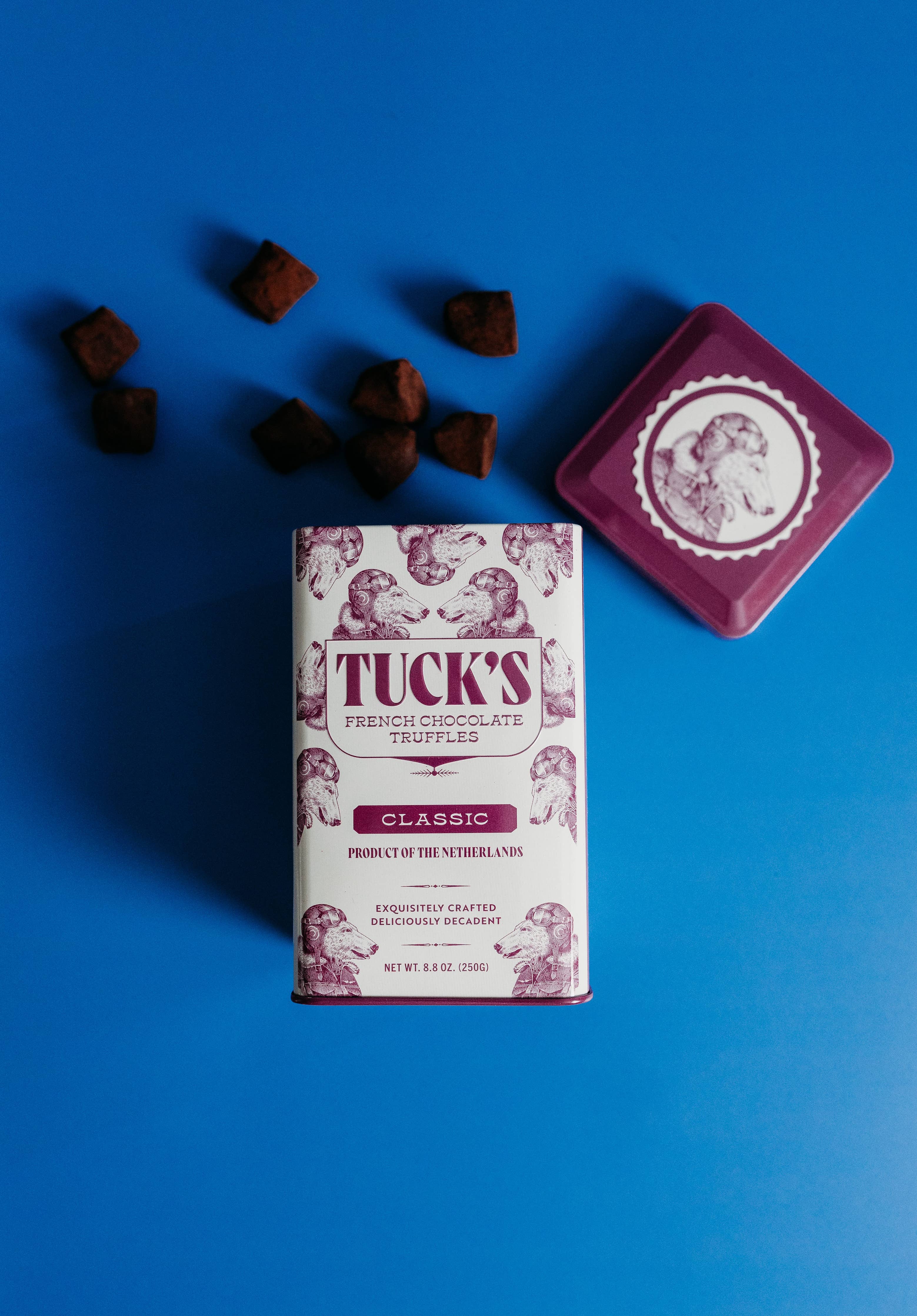 Tuck's French Chocolate Truffles packaging on a blue background