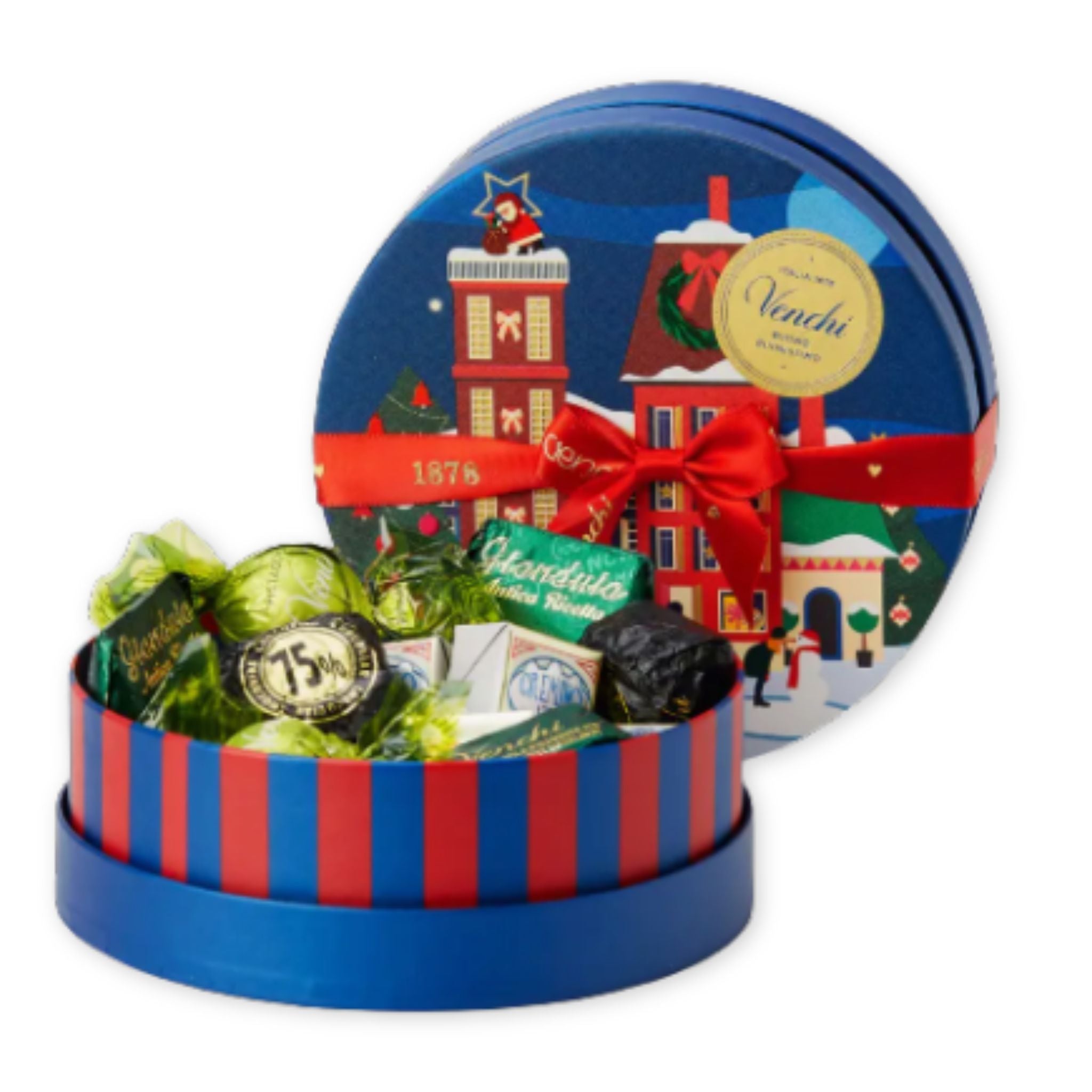 Decorative chocolate tin with a festive design and assorted chocolates.