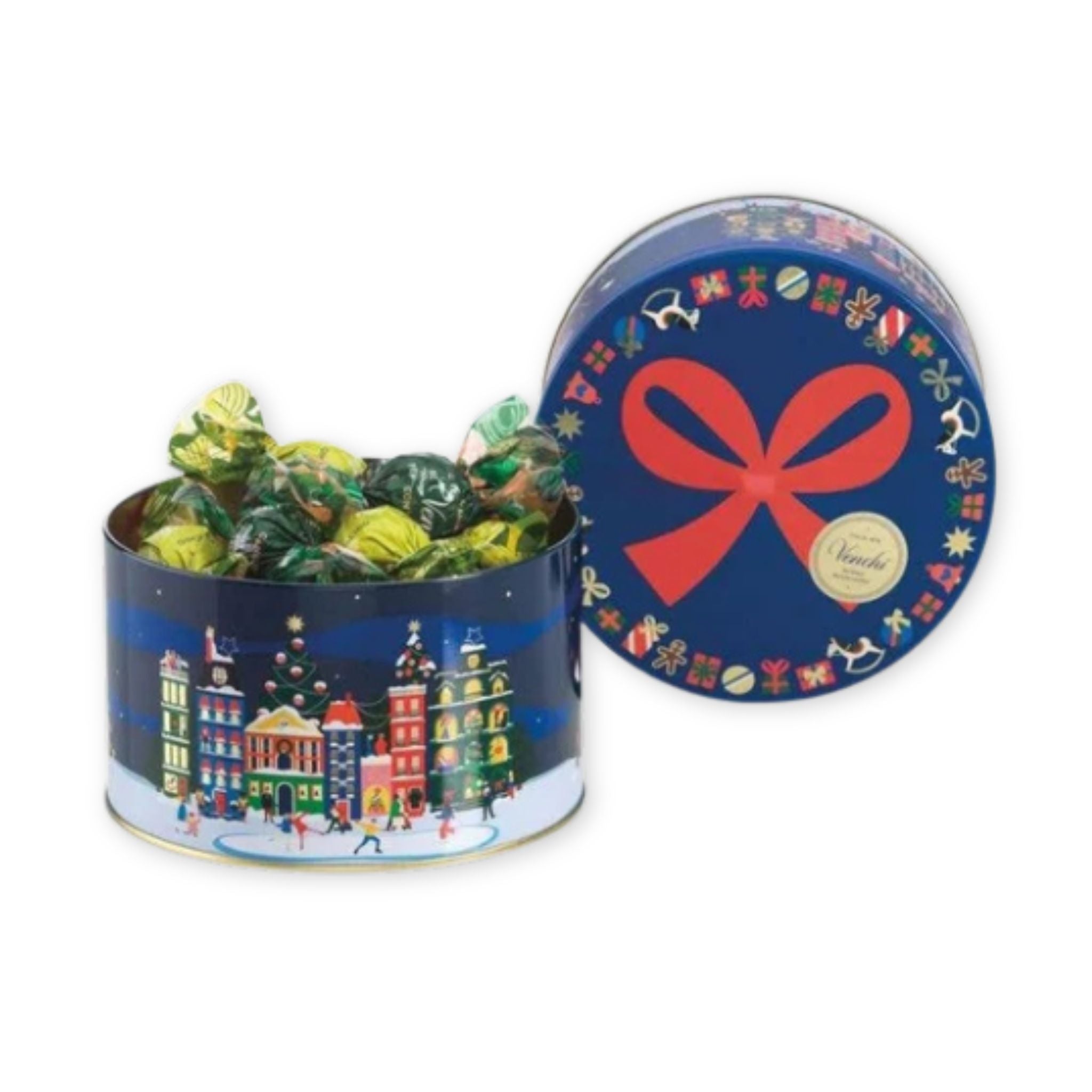 Decorative tin filled with chocolate and  red bow design.