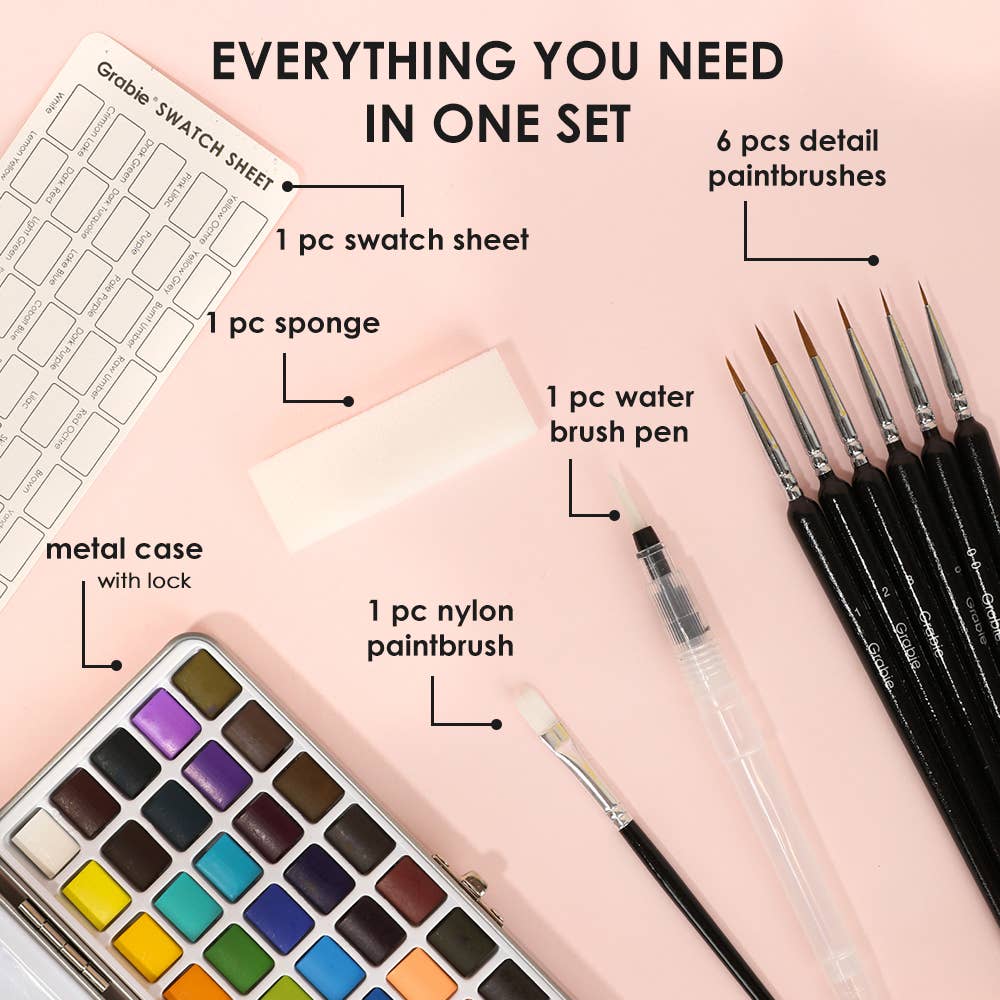 Art supply set with paintbrushes, water brush, swatch sheet, and metal case on a pink background.